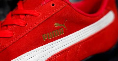 Puma shares tumble on downbeat outlook hit by weakness in US and China