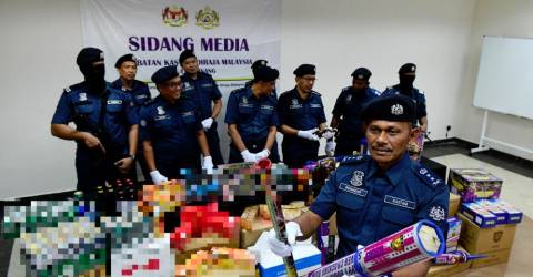 Penang Customs raids remote warehouse storing contraband liquor